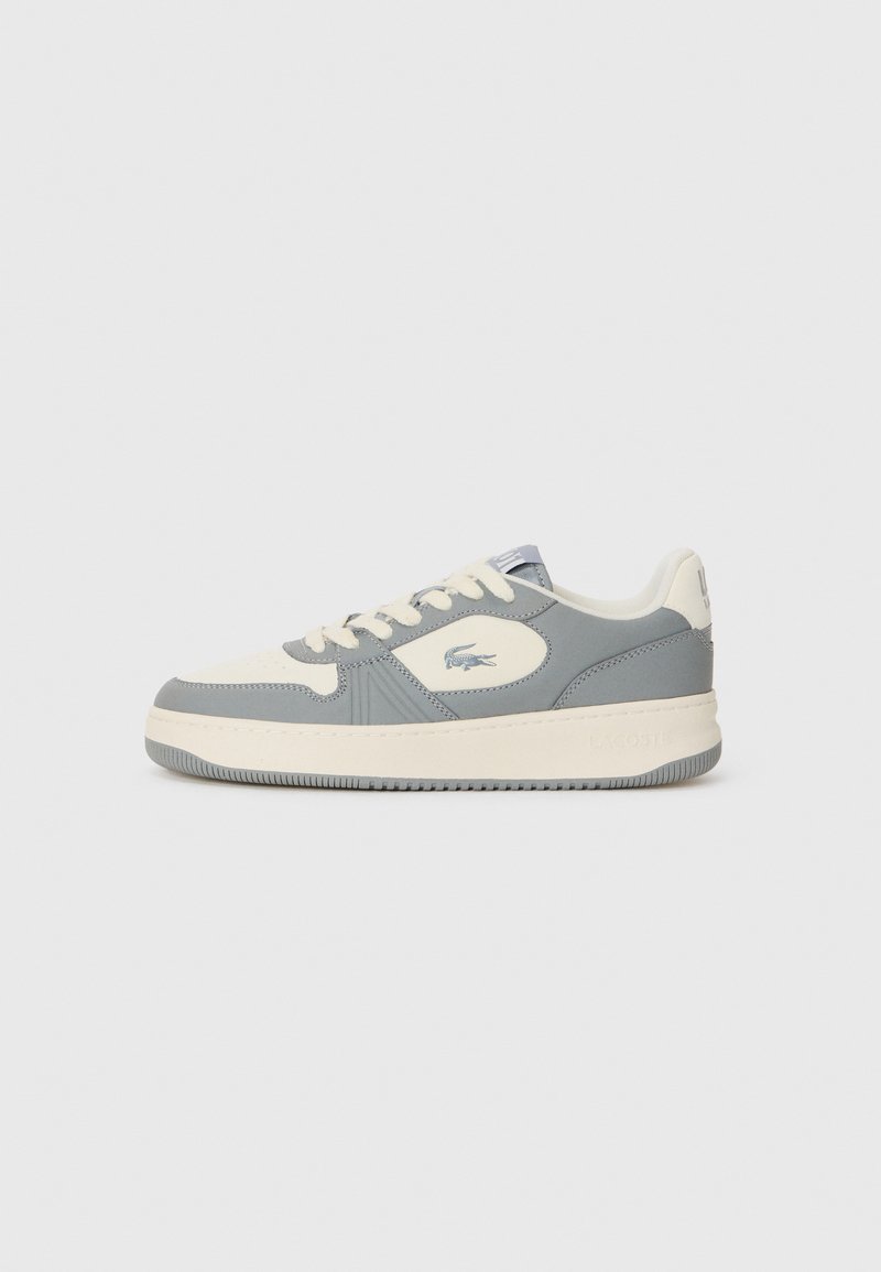 Sapatilhas cinzas e creme com parte superior em couro liso, bico redondo e sola texturizada. Apresenta logótipo na lateral e na língua. Design clássico com atacadores.