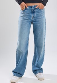 America Today RELAXED FIT - Straight leg jeans - medium used