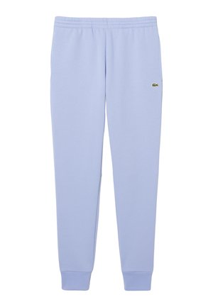 Pantalones de chándal azul claro con cintura y puños elásticos, que presentan un pequeño logo de cocodrilo verde en el muslo derecho.