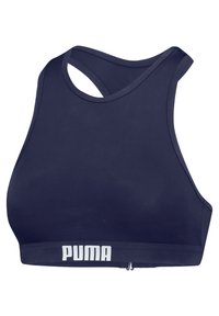 Námornícky modrý športový podprsenka s hladkým, elastickým materiálom. Obsahuje dizajn s prekrížením na chrbte a bielym logom "PUMA" na spodnom pruhu.