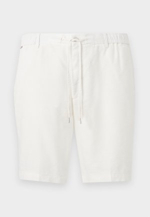 Pantalones cortos blancos a la altura de la rodilla con cinturilla elástica y cordón frontal, parte delantera plana y trabillas para cinturón.