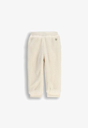 Joggery z dzianiny w kolorze kremowym, wykonane z miękkiego, teksturowanego materiału, z prążkowanym paskiem w talii i mankietami oraz małym akcentem z logo.