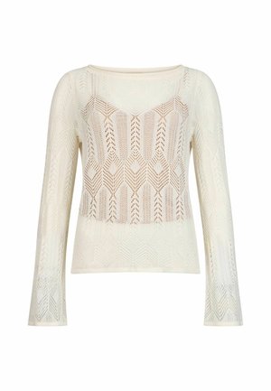 Haut en maille à manches longues de couleur crème avec un motif géométrique en dentelle ajourée, un col rond et un design légèrement transparent.