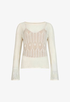 Haut en maille à manches longues de couleur crème avec un motif géométrique en dentelle ajourée, un col rond et un design légèrement transparent.