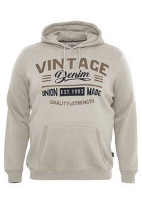 Sudadera con capucha beige que presenta un bolsillo tipo canguro en el frente, puños acanalados y un estampado vintage con texto en marrón oscuro y azul marino.