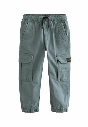 Pantalon cargo vert avec taille et poignets élastiques, cordon noir, deux poches latérales et deux grandes poches à rabat sur les jambes.