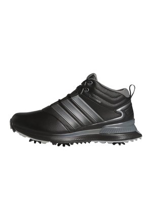 Scarpa da golf Adidas Climaproof nera e grigia con tacchetti sulla suola e chiusura con lacci davanti, vista dal lato.
