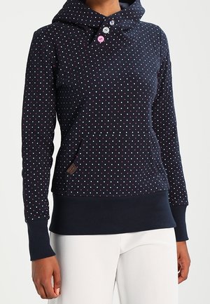Marineblauwe hoodie met kleine roze en witte stippen, vier knopen bij de hals en een voorzak.