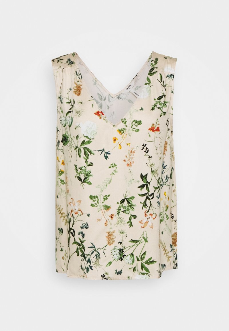 Haut beige sans manches avec col en V, décoré d'un motif floral botanique multicolore comprenant des feuilles vertes et de petites fleurs.