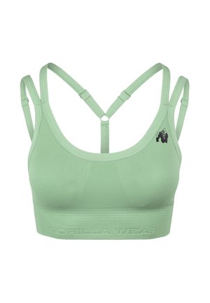 Lichtgroene sportbeha gemaakt van rekbare stof. Het heeft brede banden, een racerback ontwerp en hoogwaardig logo langs de band.