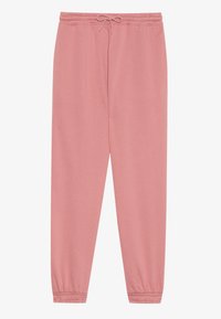 Pantaloni de trening roz, fabricați dintr-un material moale, cu un tiv elastic, șnur reglabil și manșete ajustate la glezne.