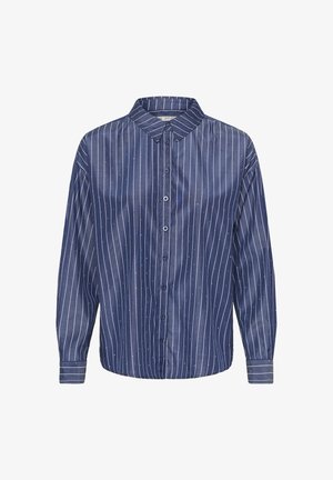 Cămașă albastru închis, cu nasturi, cu dungi verticale albe și puncte mici albe. Prezintă un guler ascuțit și mâneci lungi cu detalii la mansetă.