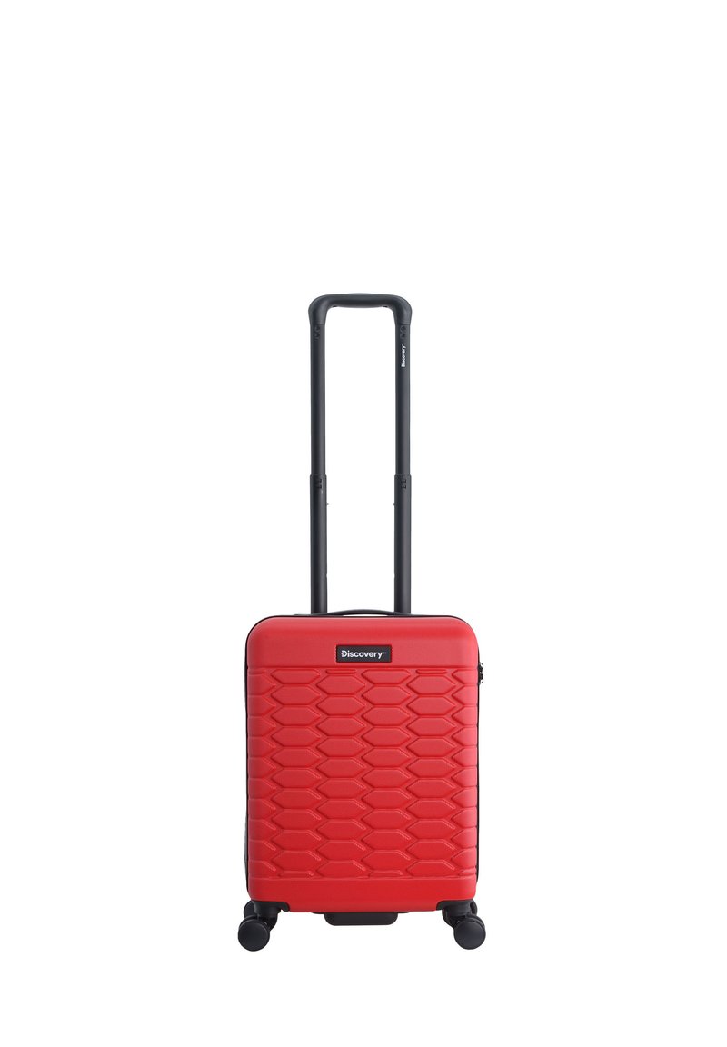 Red hardshell carry-on suitcase with a textured honeycomb pattern, retractable black handle, and four wheels for mobility.
