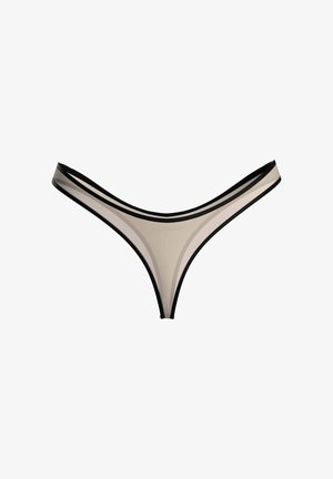 Tanga beige transparent avec bordure noire présenté sur un fond blanc.