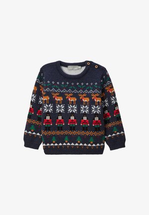 Pull en maille bleu marine orné de motifs festifs colorés de rennes, casse-noisettes et sapins. Comprend des boutons sur l'épaule.