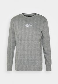 Grå långärmad sweatshirt med rutmönster, rund halsringning och logotypdetalj i vitt i mitten. Texturerad tyg.
