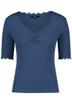 Haut court à manches courtes côtelé bleu avec bords en feston aux manches et à l'encolure, présentant un léger froncé au centre devant.
