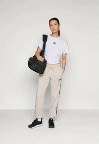 adidas Sportswear Treniņtērpa apakšdaļas - beige