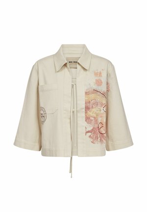 Beige cropped jakke med brede trekvartærmer, frontlomme, snorjustering og abstrakt rosa og beige print på den ene side.