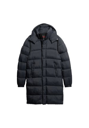 Lange donsjas in donkerblauw met een gewatteerd ontwerp, voorzien van een capuchon, twee voorzakken en elastische manchetten. Zacht, duurzaam materiaal.