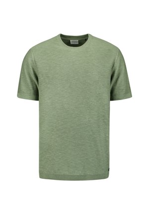 T-shirt en coton vert à manches courtes avec un col rond, un ourlet en côtes et une texture subtile. Présente un petit logo sur le côté.