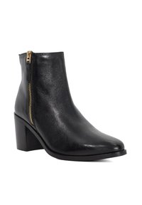 Black leather ankle boot with a tapered toe and a block heel, featuring a gold side zipper and smooth, shiny texture.