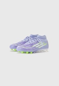 Football boots with a light purple mesh upper, neon green accents, a high collar, and conical studs for traction. Features three white stripes.