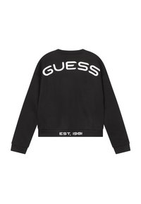 Sudadera negra recortada con letras blancas "GUESS" en la parte posterior y "EST. 1981" en el dobladillo. Fabricada con una tela suave y de ajuste casual.