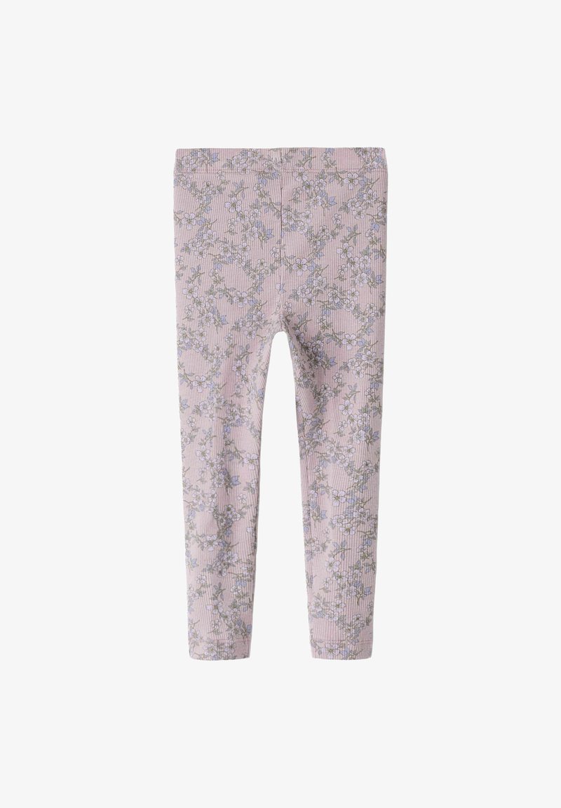 Leggings côtelés roses avec un motif floral de petites fleurs bleues et des tiges vertes, offrant un design ajusté et extensible.