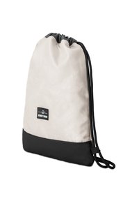 Világos bézs színű, fekete aljú húzózsinóros táska. Logó folttal és fekete húzózsinórokkal rendelkezik. Simma textúrájú, minimalista dizájn.