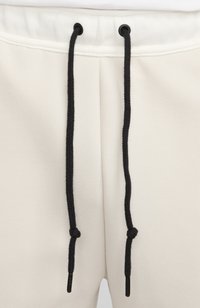 Nike Sportswear Jogginghose - light orewood brown sail black