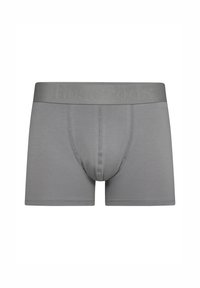 Bóxer gris para hombre con una cinturilla elástica suave que presenta un logotipo de la marca en relieve, diseñado para un ajuste ceñido con costuras mínimas.