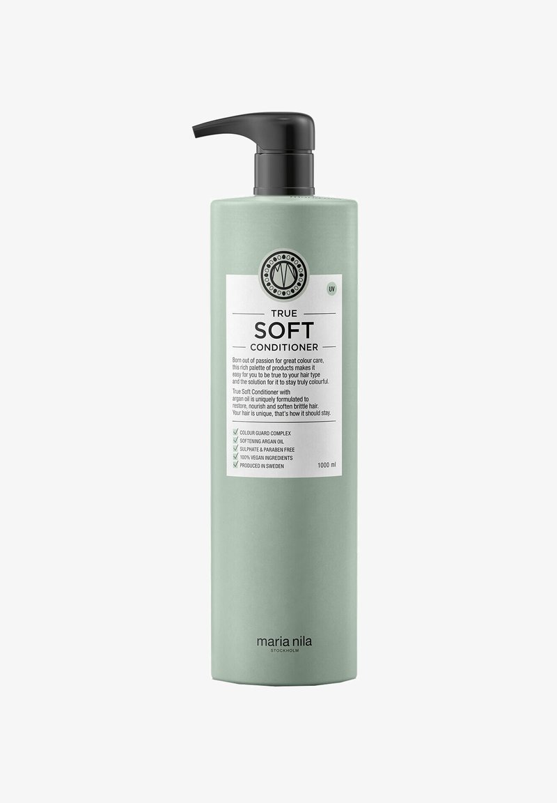 Green bottle conditioner with a pump top. Label includes product name, ingredients, and certifications. Size noted as 1000 ml.