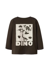 Rjava majica z dolgimi rokavi, ki vsebuje velik bel grafični print z ilustracijami dinozavrov ter besedilom "DINO" na dnu. Material: bombaž.