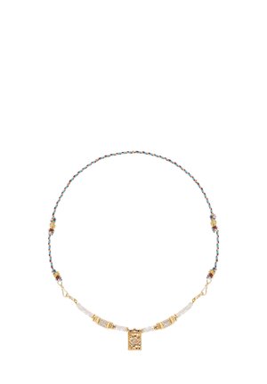 Gold necklace with a rectangular pendant, braided multicolored thread, and textured beads. Features alternating clear and colored elements.