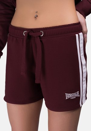 Pantaloni sportivi bordeaux con strisce laterali bianche, cintura elastica, chiusura con cordino e un piccolo logo ricamato sull'orlo.