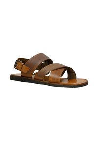 Sandales en cuir marron avec des sangles croisées, une bande texturée et une semelle plate avec une sangle à la cheville à boucle. Doublure intérieure lisse.