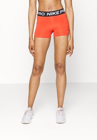 Nike Performance W NP 365  3IN - Leggings - rot/schwarz/weiss