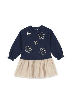 Haut à manches longues bleu marine pour enfant avec motifs de fleurs en sequins, associé à une jupe en tulle beige attachée à la taille.