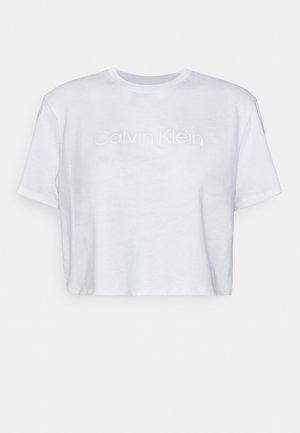 Wit cropped T-shirt met korte mouwen en verhoogd wit Calvin Klein-logo centraal aan de voorkant.