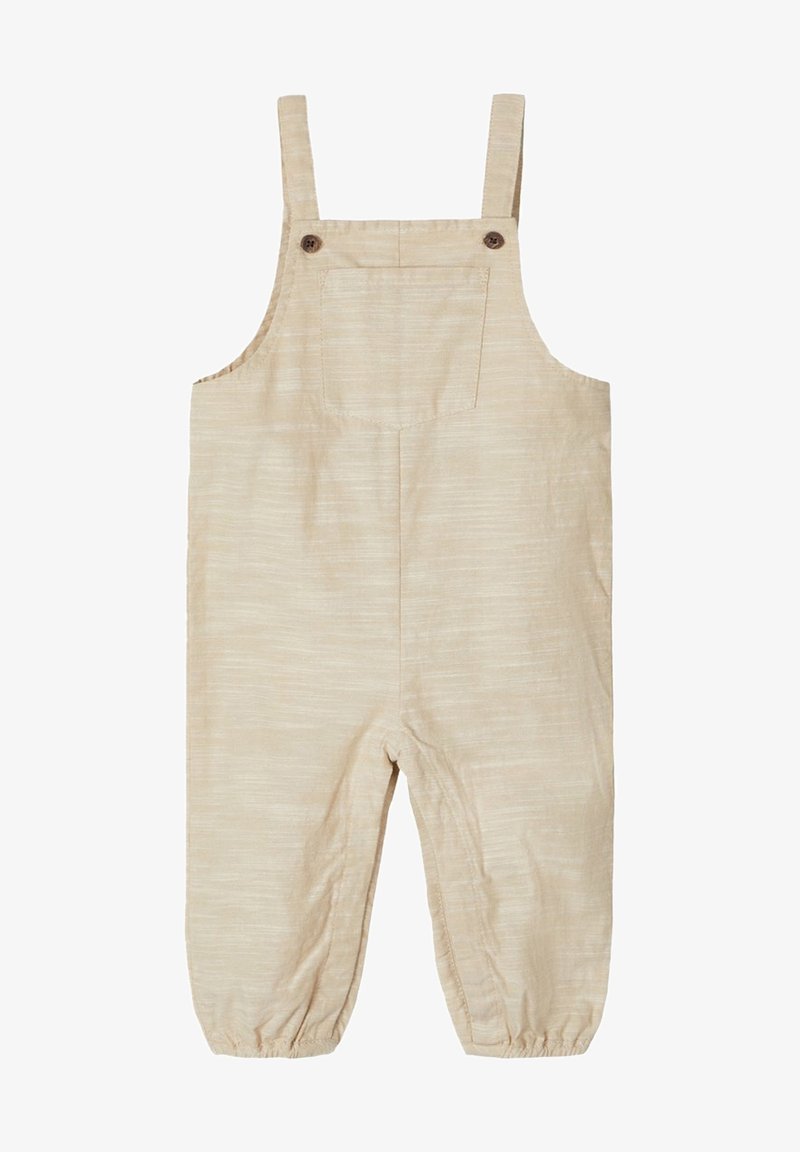 Beige lněné overaly s nastavitelnými ramínky, přední kapsou a elastickými manžetami na spodní části. Hladká textura s jemnými pruhy.