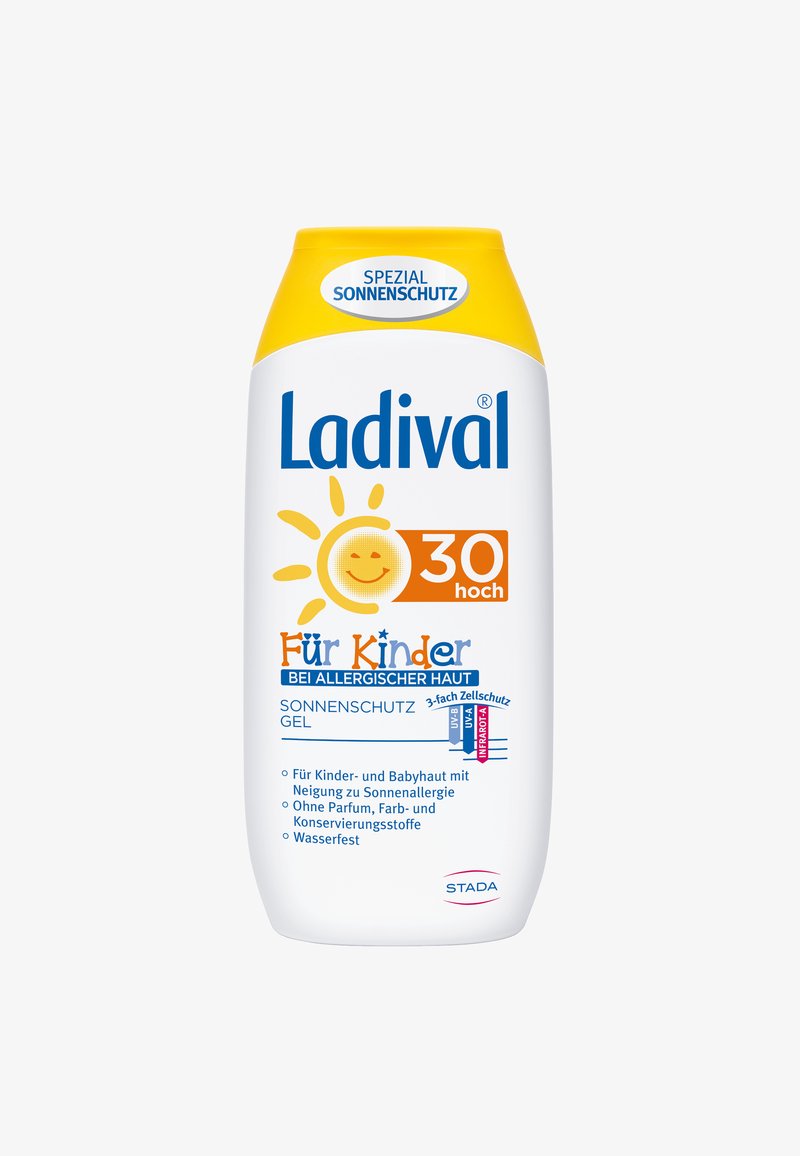 Ladival sunscreen gel for children in a white bottle with a yellow cap. Features a smiling sun graphic and labels in blue and orange.