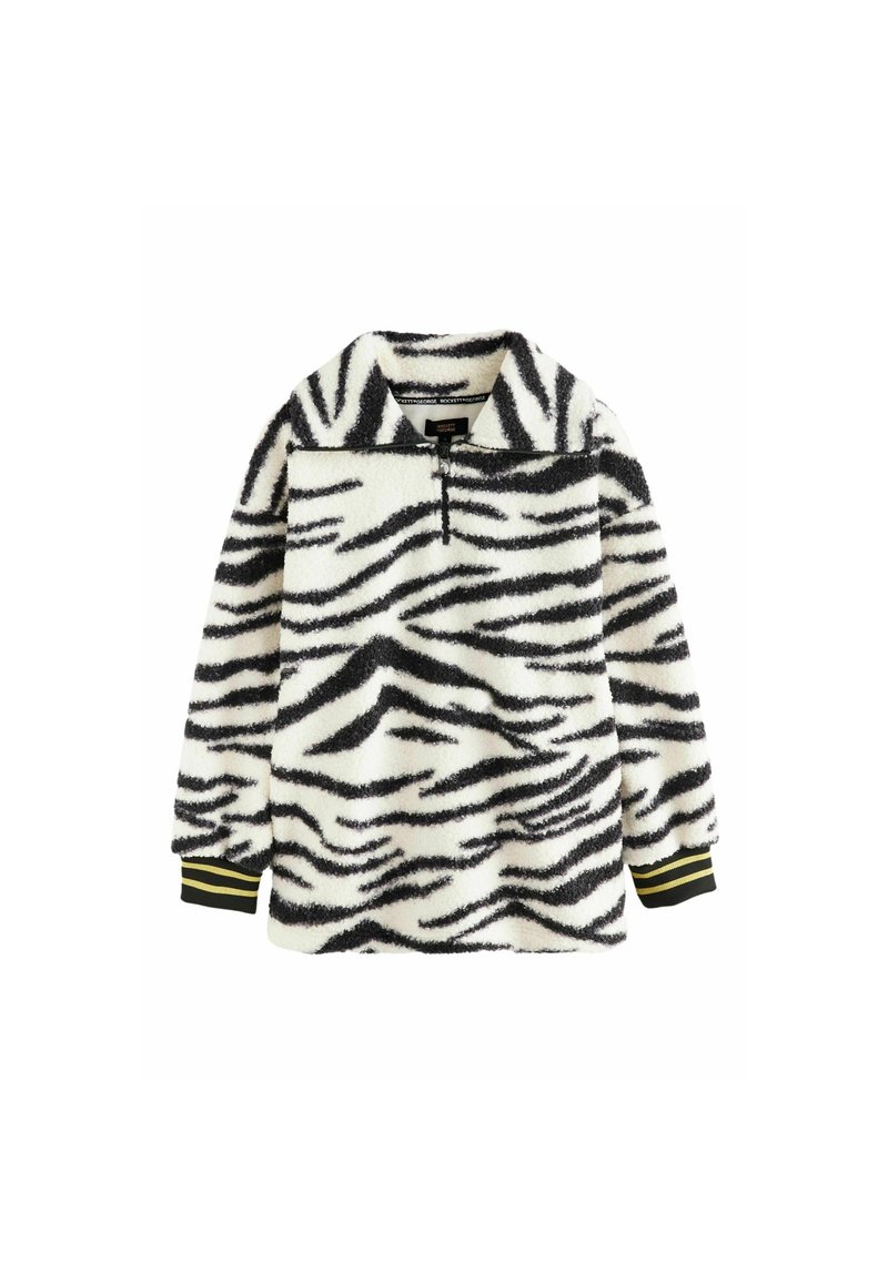 Pullover med zebra-mønster lavet af blødt, tekstureret stof. Har en lynlåslukning i halsen og sorte manchetter med gule striber. Sort og hvid farver.