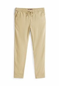 Beige Hose mit elastischem Bund, Kordelzugverschluss, seitlichen Taschen und geradem Bein. Der Stoff hat eine glatte Textur.