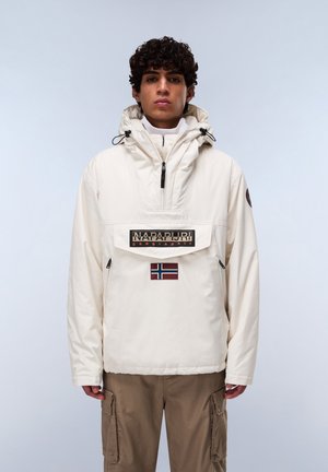 Light beige hooded pullover jacket with a zippered neck, front pocket, and branded patch. Features a Norwegian flag accent and adjustable drawstrings.