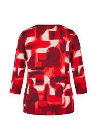 Rotes und weißes langärmliges Oberteil mit abstraktem Muster und rundem Ausschnitt, Rückansicht.