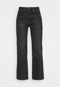 High-waisted black denim jeans with a straight leg, prominent stitching, and a front button closure. Smooth texture and classic design.