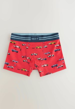Rote Boxershorts mit einem bunten Auto-Print, ausgestattet mit einem dunkelblauen elastischen Bund mit dem Aufdruck „NEXT“ und einem weichen, dehnbaren Stoff.