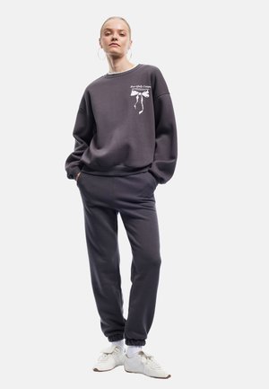 JOGGER  - Träningsbyxor - anthracite