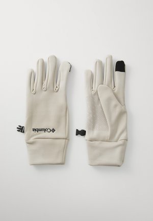 Beige gloves with a smooth texture, featuring a black thumb tip, grip accents on palms, and logo detail. Fastening clip at the wrist.